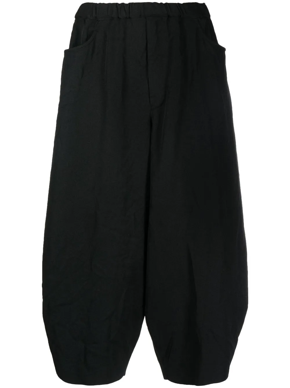 

Black Comme Des Garçons tapered three-quarter shorts