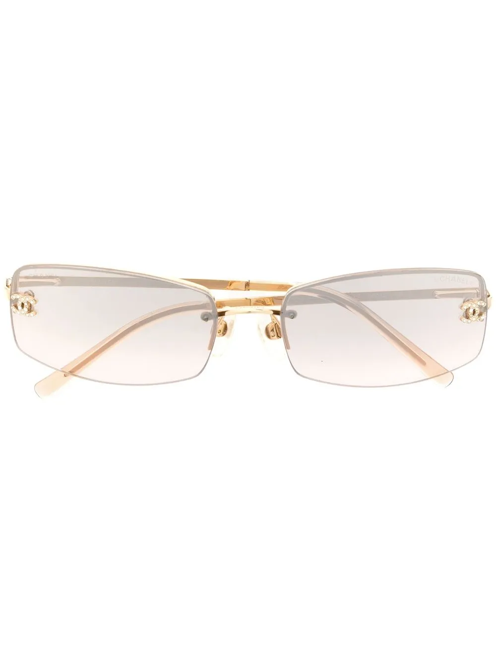 

Chanel Pre-Owned 1990-2000s oval-frame sunglasses - Brown
