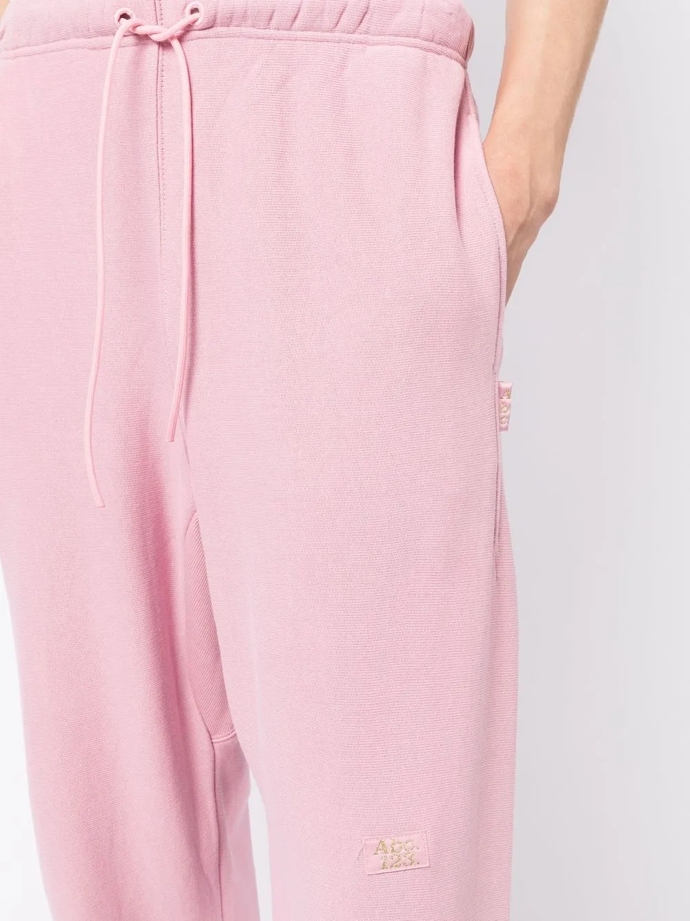 Advisory Board Crystals Drawstring Track Pants In Pink