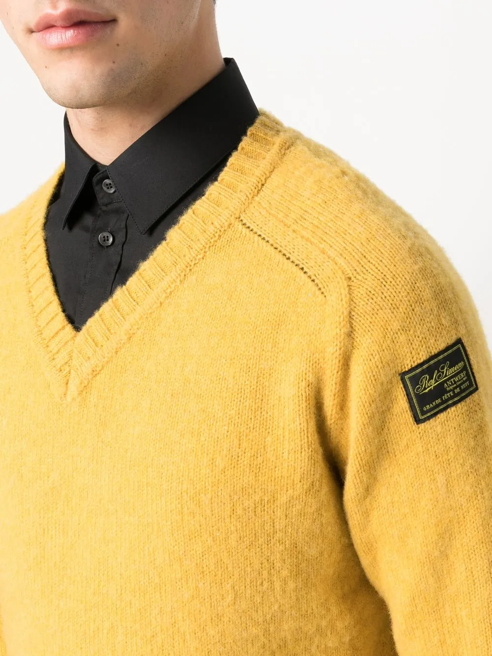 Raf Simons Logo patch V neck Jumper Farfetch raf-simons-logo-patch-v-neck-jumper-farfetch