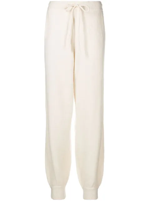 REMAIN tapered-leg knitted trousers