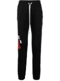 AMIRI logo-print track pants - Black