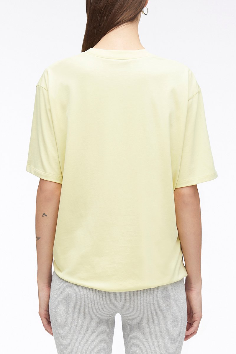 Short Sleeve Draped Cotton Jersey T-Shirt-yellow #1 Short Sleeve Draped Cotton Jersey T-Shirt, drape-detail cotton T-shirt from 3.1 PHILLIP LIM featuring light yellow, cotton, draped detailing, round neck, short sleeves and straight hem.- 3