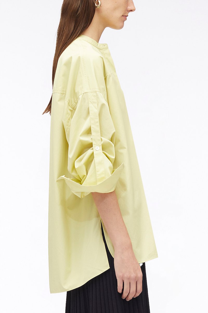 Long Sleeve Classic Poplin Shirt-yellow #0 Long Sleeve Classic Poplin Shirt, cotton long-sleeved shirt from 3.1 PHILLIP LIM featuring light yellow, cotton, chest patch pocket, band collar, concealed front fastening, drop shoulder, long sleeves, tie sleeves and side slits.- 2