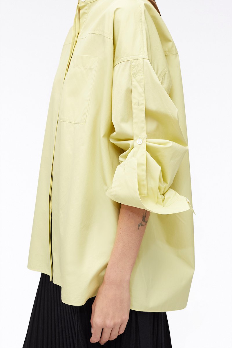 Long Sleeve Classic Poplin Shirt-yellow #0 Long Sleeve Classic Poplin Shirt, cotton long-sleeved shirt from 3.1 PHILLIP LIM featuring light yellow, cotton, chest patch pocket, band collar, concealed front fastening, drop shoulder, long sleeves, tie sleeves and side slits.- 4