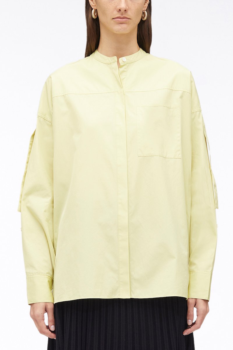 Long Sleeve Classic Poplin Shirt-yellow #1 Long Sleeve Classic Poplin Shirt, cotton long-sleeved shirt from 3.1 PHILLIP LIM featuring light yellow, cotton, chest patch pocket, band collar, concealed front fastening, drop shoulder, long sleeves, tie sleeves and side slits.- 5