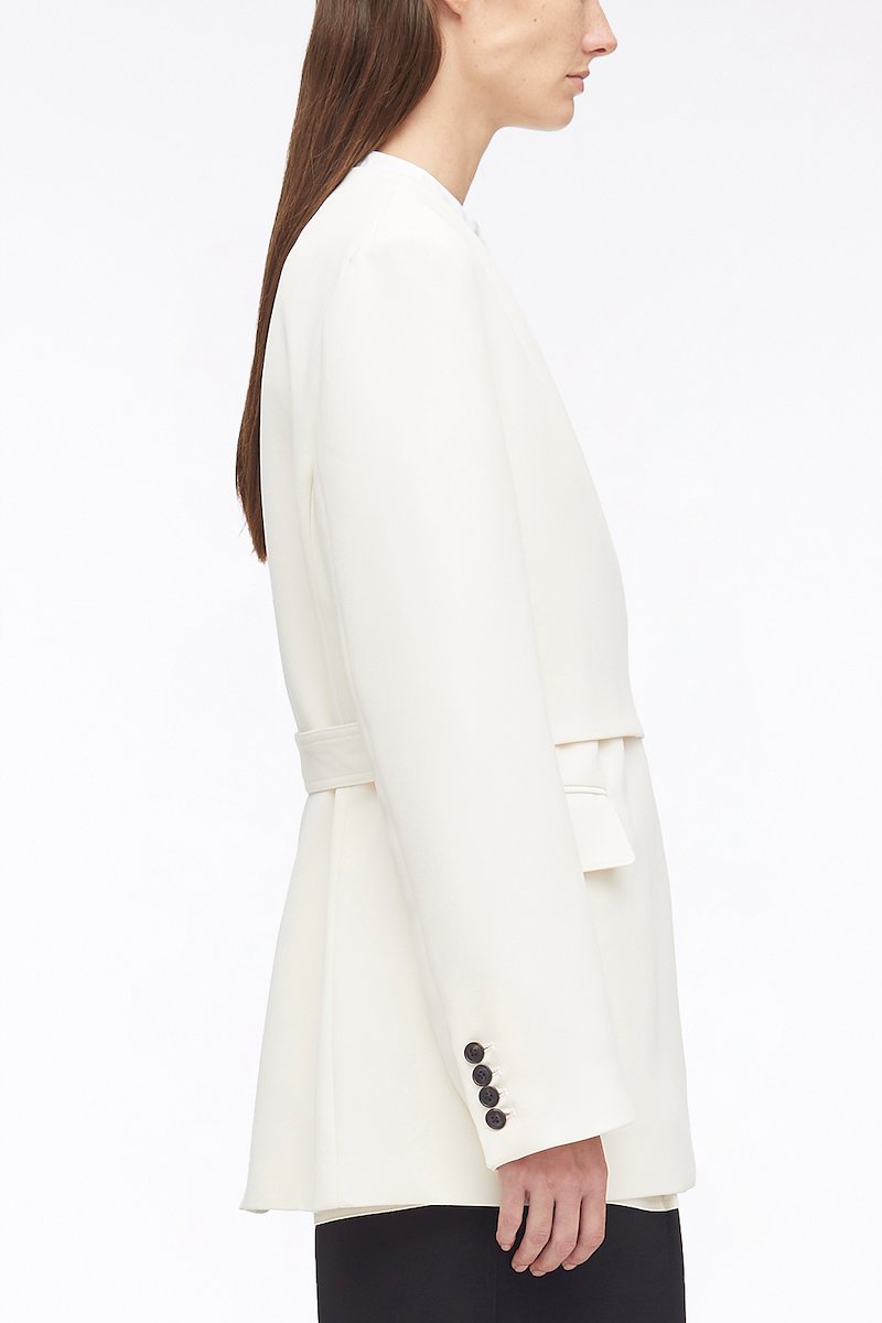 Heavy Cady Wrap Blazer-white #0 Heavy Cady Wrap Blazer, heavy candy wrap blazer from 3.1 PHILLIP LIM featuring off-white, collarless, V-neck, wrap design, side buckle fastening, long sleeves, buttoned cuffs, two side flap pockets and central rear vent.- 2