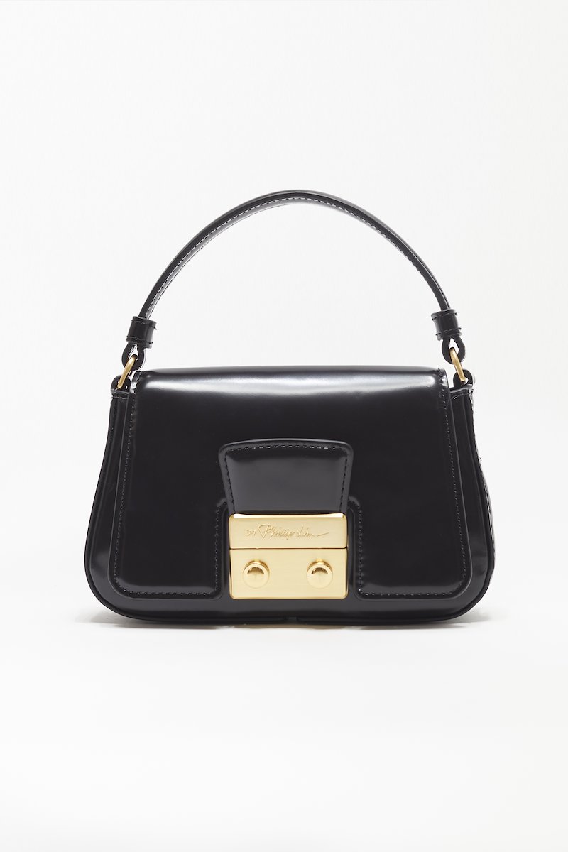 Pashli Micro Chain-black #0 Pashli Micro Chain, Pashli Micro Chain crossbody bag from 3.1 PHILLIP LIM featuring black, calf leather, polished finish, engraved logo, gold-tone hardware, detachable chain-link shoulder strap, single circular top handle, foldover top and gold-tone clasp fastening.- 0