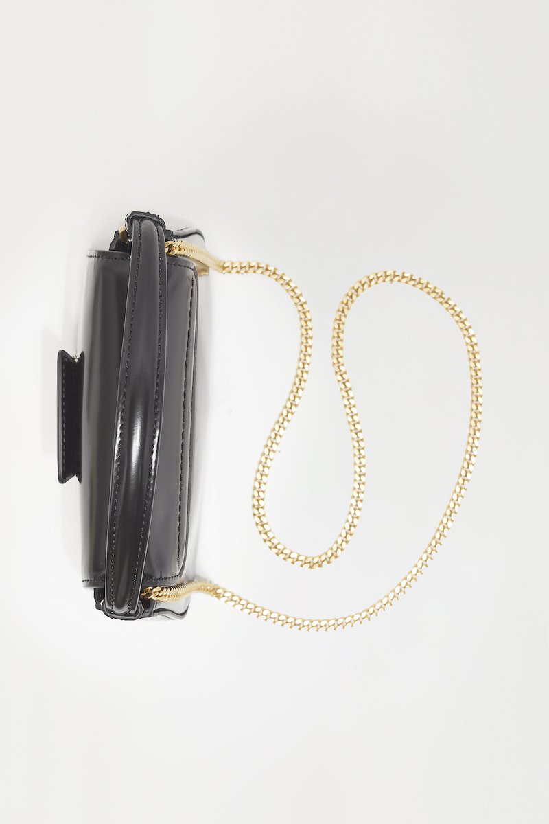 Pashli Micro Chain-black #1 Pashli Micro Chain, Pashli Micro Chain crossbody bag from 3.1 PHILLIP LIM featuring black, calf leather, polished finish, engraved logo, gold-tone hardware, detachable chain-link shoulder strap, single circular top handle, foldover top and gold-tone clasp fastening.- 3