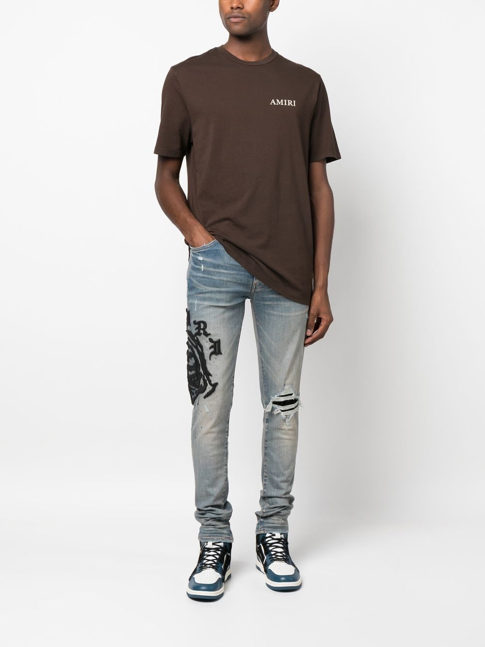 AMIRI logo-embroidered Skinny Jeans - Farfetch