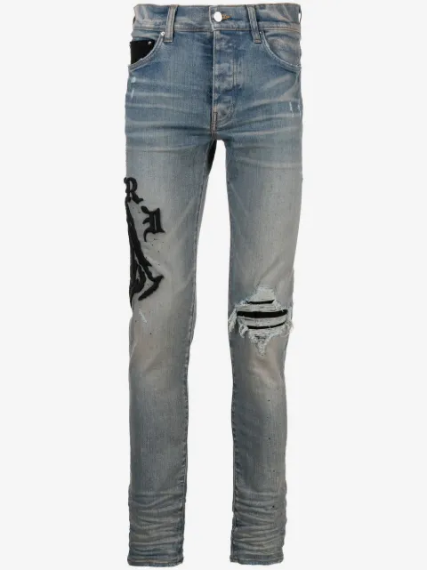 AMIRI logo-embroidered skinny jeans