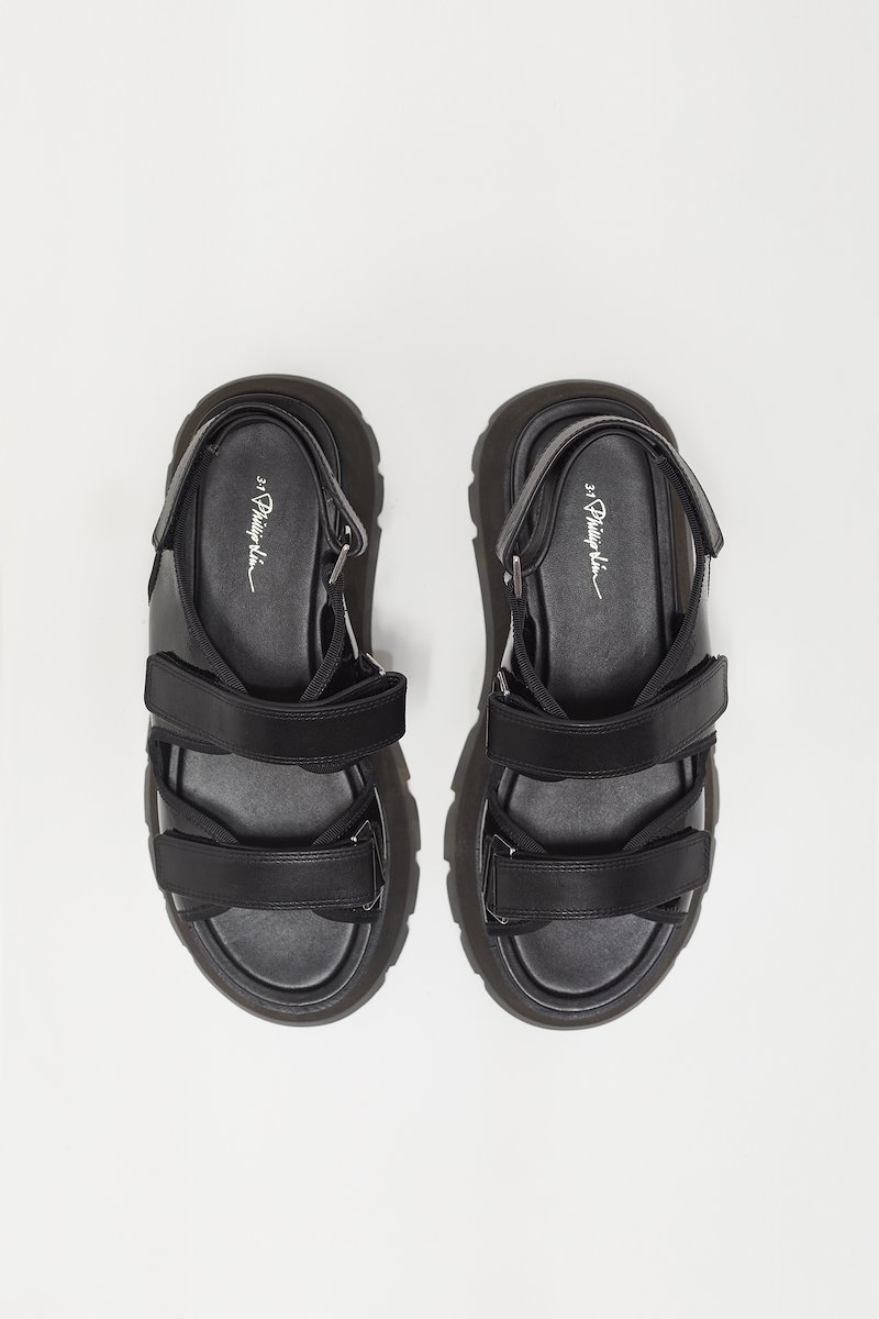 Kate Lug Sole Dad Sandal, Kate leather sandals from 3.1 PHILLIP LIM featuring black, goatskin, open toe, strap detailing, touch-strap fastening, slingback strap, branded leather insole and rubber lug sole.- 1