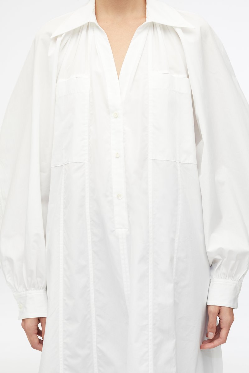 Shirred Puff Sleeve Classic Poplin Shirt Dress-white #0 Shirred Puff Sleeve Classic Poplin Shirt Dress, shirred puff sleeves shirt dress from 3.1 PHILLIP LIM featuring white, cotton, poplin texture, shirred effect, classic collar, V-neck, long puff sleeves, chest patch pocket and below-knee length.- 4