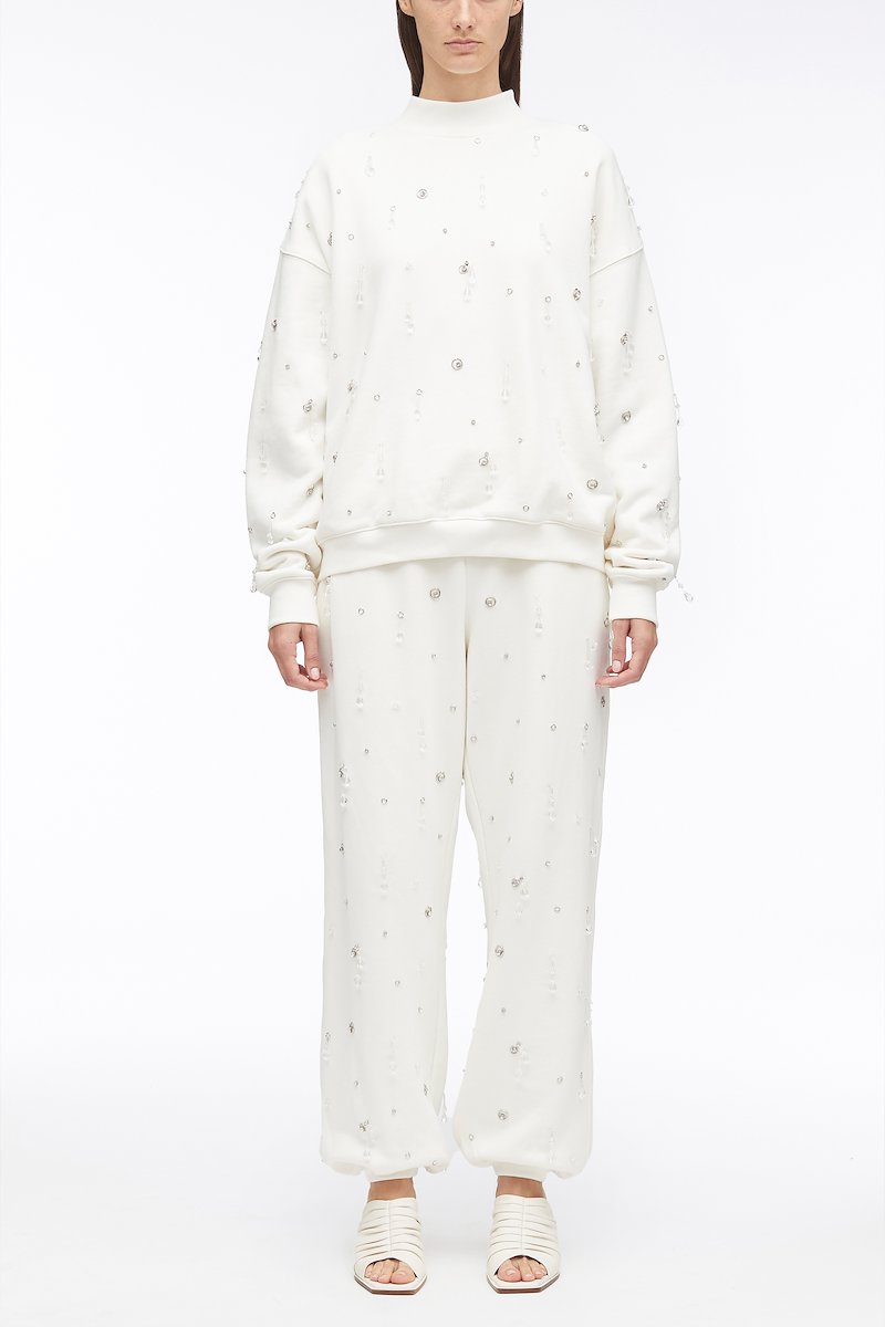 Drip Embellished Compact French Terry Sweatpant-white #0 Drip Embellished Compact French Terry Sweatpant, drop-embellished Terry track trousers from 3.1 PHILLIP LIM featuring cotton, crystal embellishment, gemstone detailing, high waist, elasticated waistband, straight leg, elasticated ankles and antique white.- 0