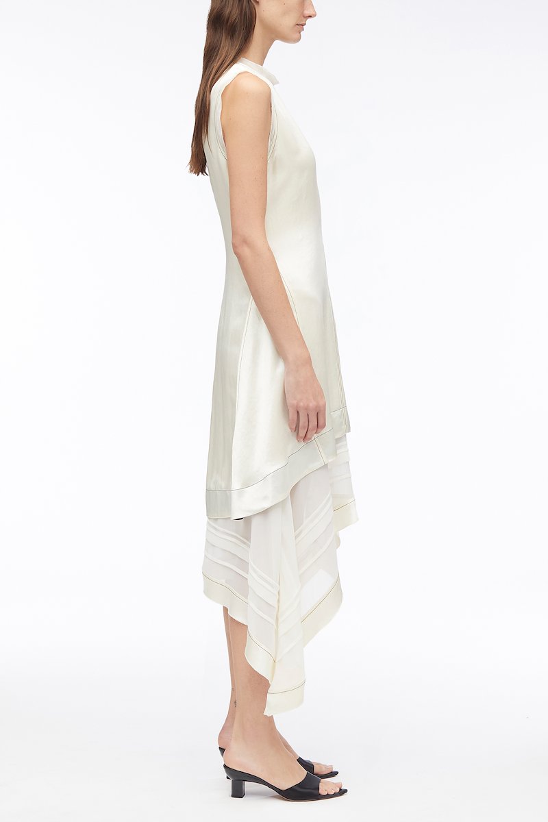 Asymmetric Hem Sleeveless Satin Combo Dress-white #1 Asymmetric Hem Sleeveless Satin Combo Dress, asymmetric satin mid dress from 3.1 PHILLIP LIM featuring cream white, satin weave, layered design, contrast stitching, crew neck, sleeveless, asymmetric hem and below-knee length.- 1