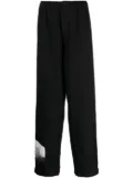 Undercover graphic-patch wool trousers - Black
