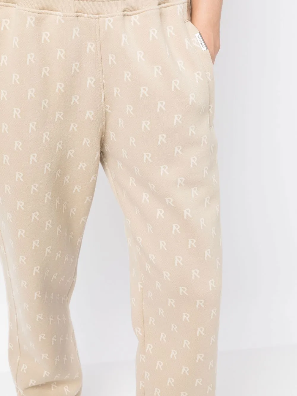 Represent Monogram-print Track Pants In Neutrals