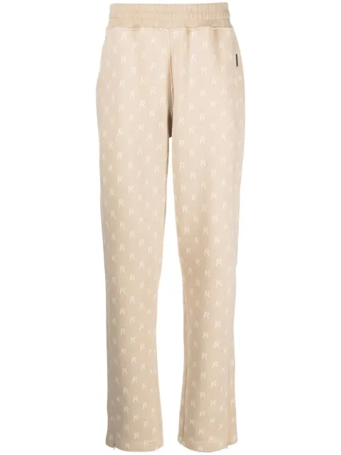 Represent pants con monograma estampado