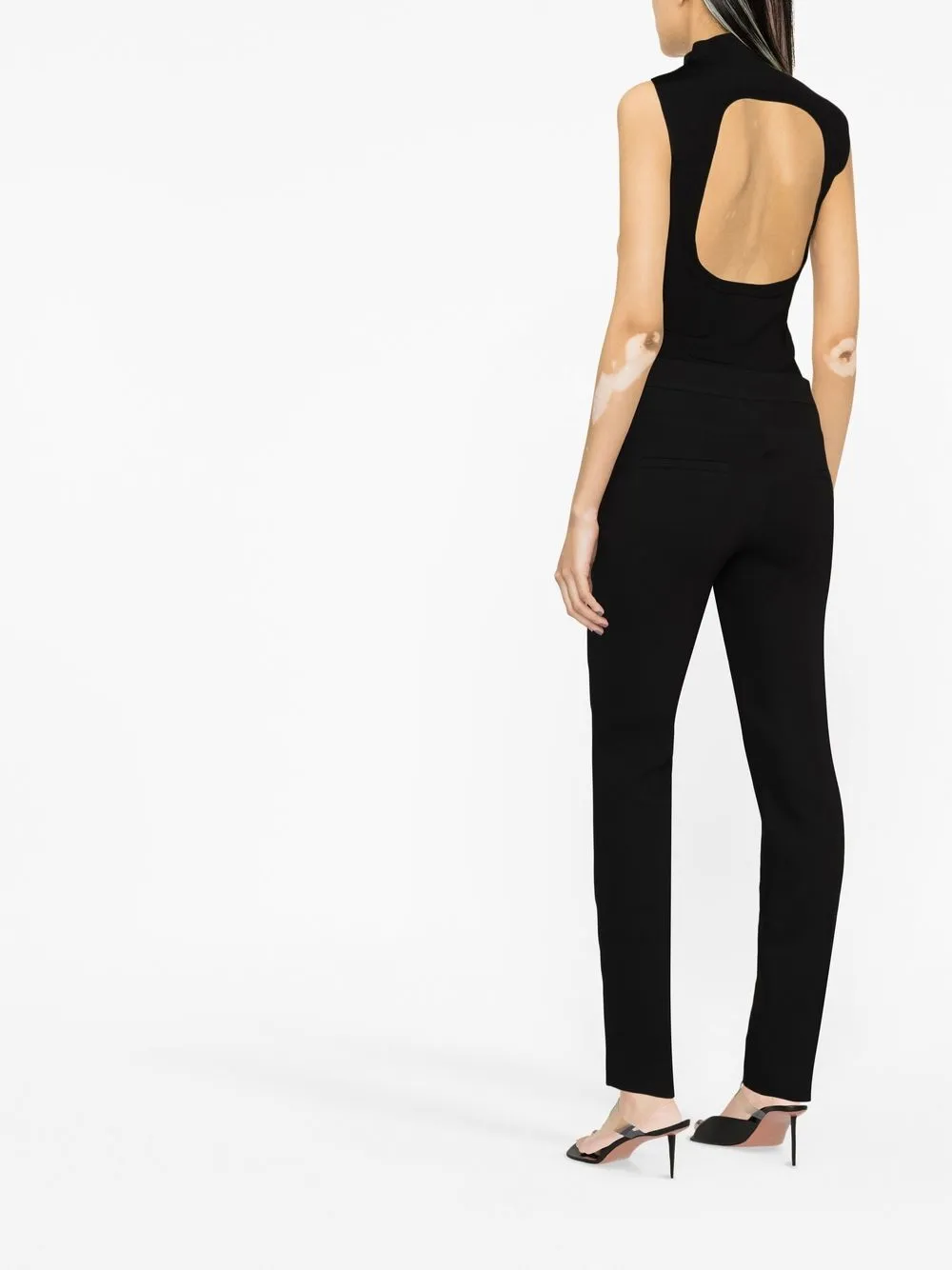 Shop Courrèges Mid-rise Slim-fit Trousers In Black