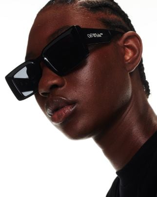 off white sunglasses on face