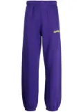 Off-White logo-print track pants - Purple