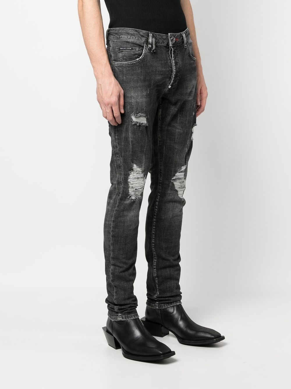 Saint laurent black ripped hot sale jeans