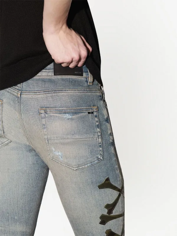AMIRI Camo Bones Skinny Jeans | Blue | FARFETCH