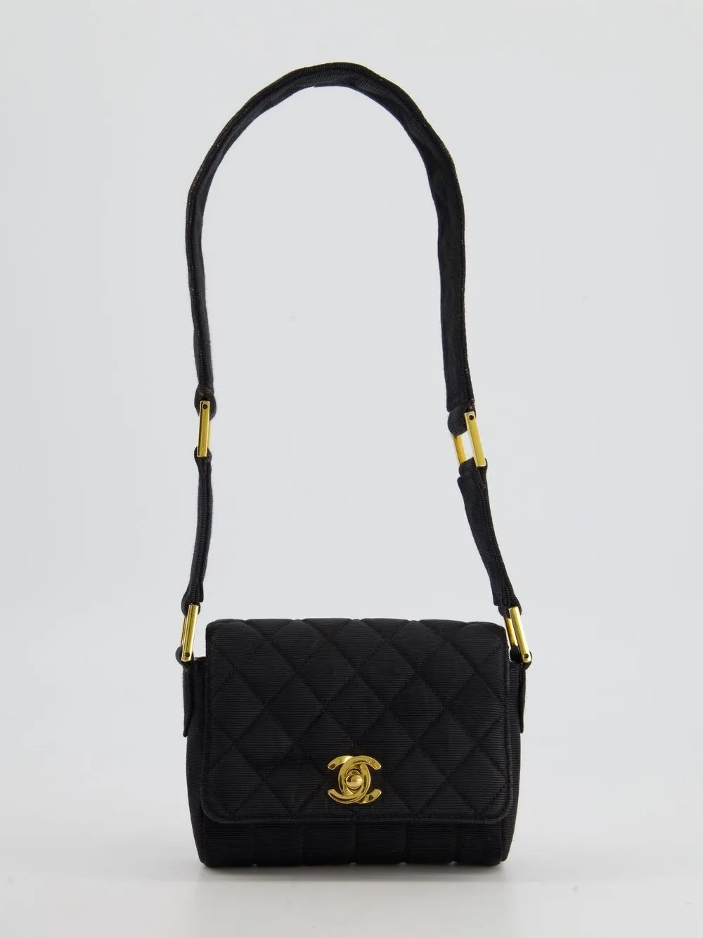 

Chanel Pre-Owned 1989-1991 diamond-quilted mini flap shoulder bag - Black
