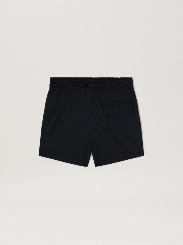 Curved Logo Beachwear Short in black - Palm Angels® Official