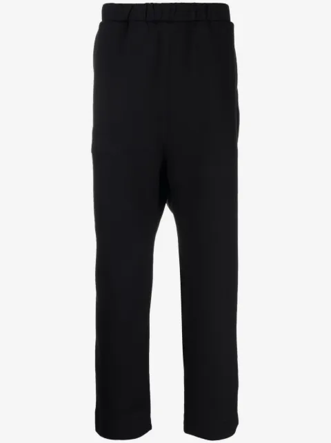White Mountaineering pantalon de jogging à poches multiples 