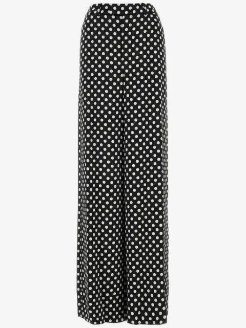 Saint Laurent pantalones de seda con estampado de lunares
