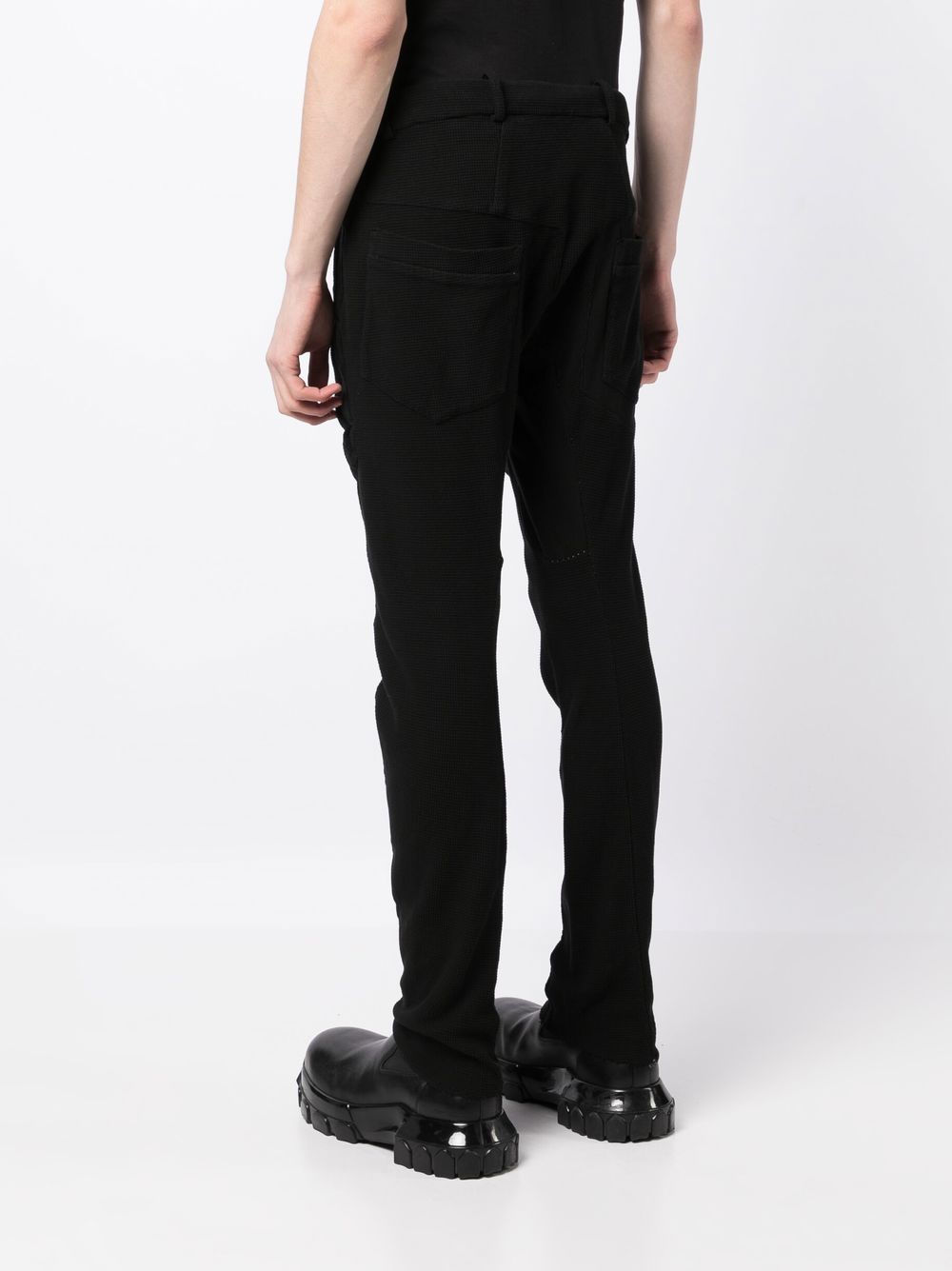 Shop Masnada Waffle-effect Cotton Slim Trousers In Black