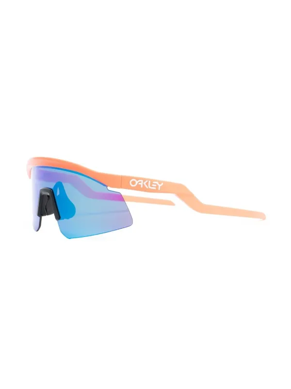 Oakley logo-print blue-tinted Sunglasses - Farfetch