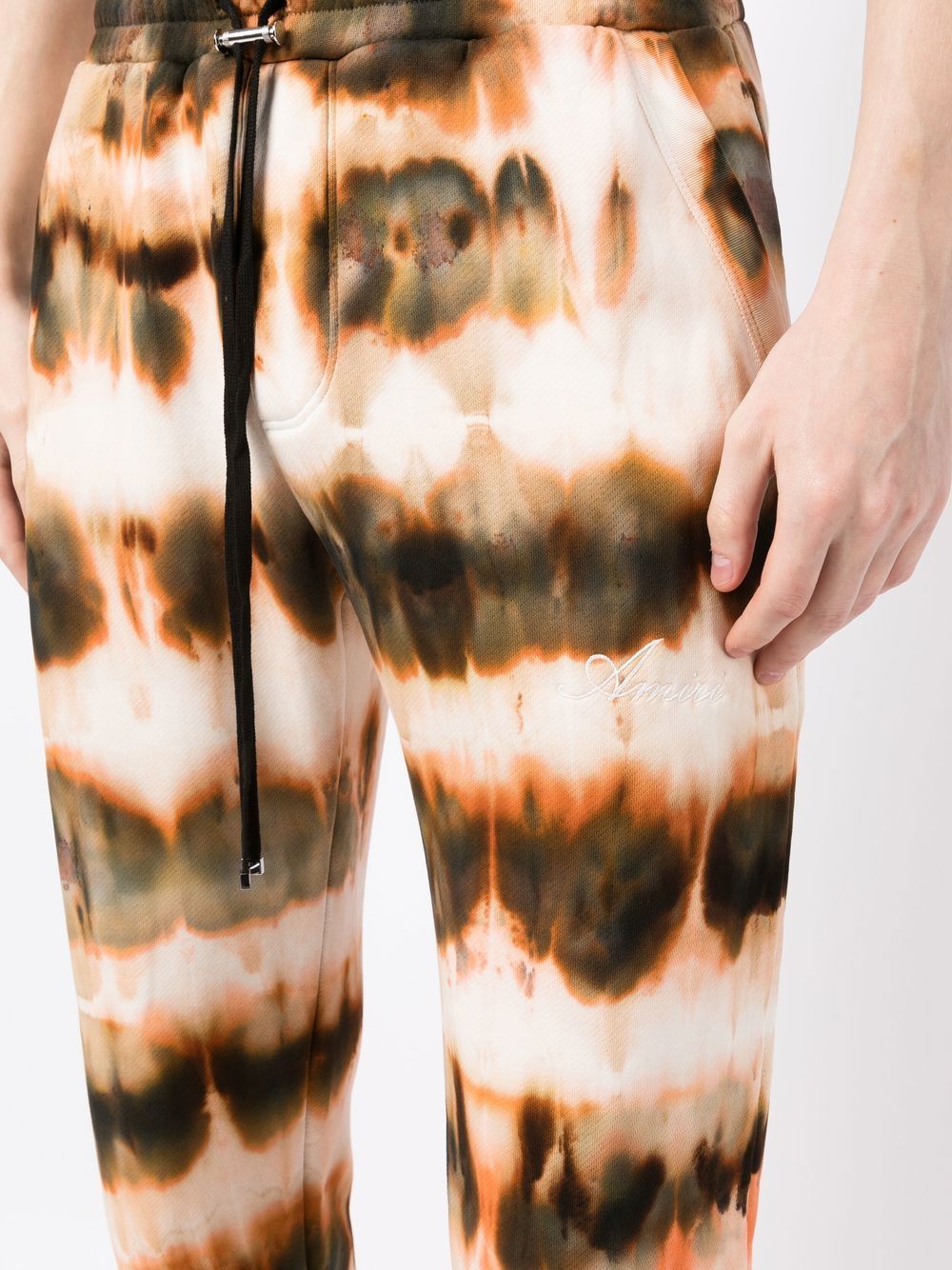 Shop Amiri Tie-dye Print Cotton Track Pants In Brown