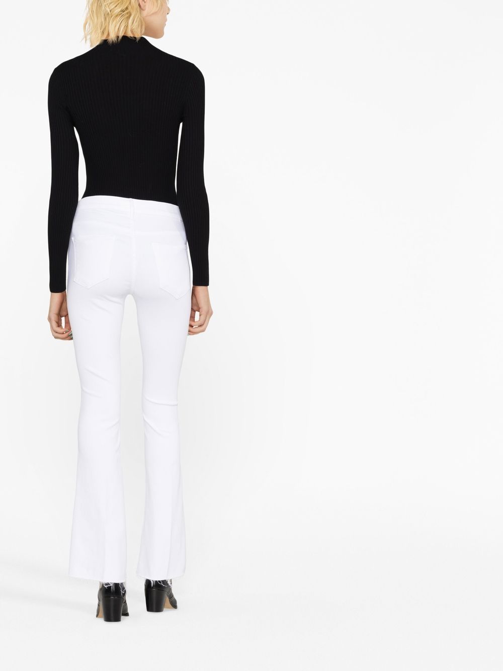 Shop Mother Mid-rise Flared Jeans In White