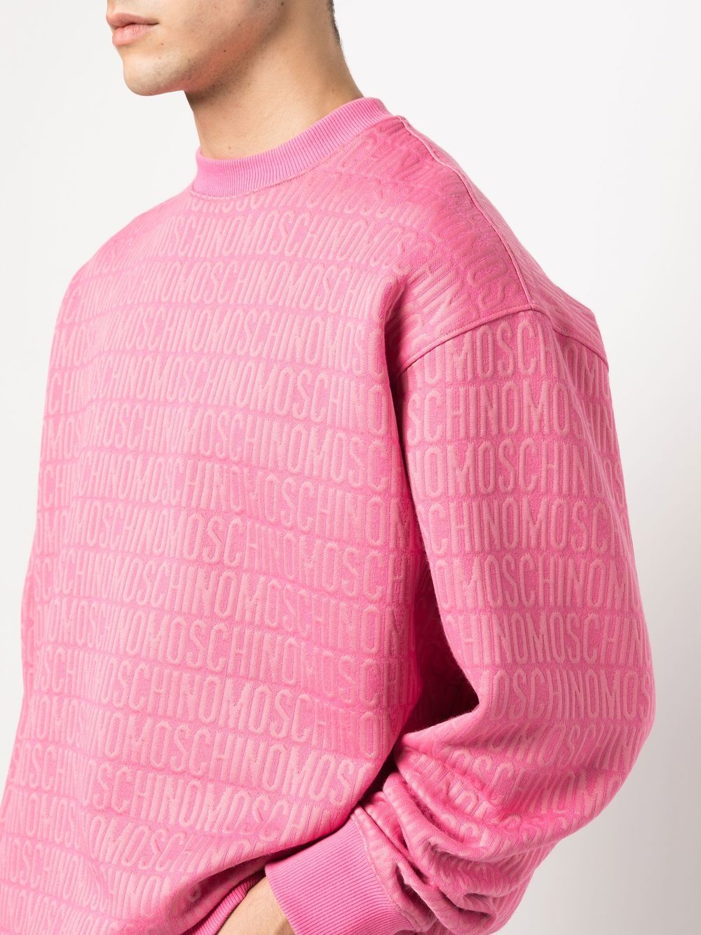 Shop Moschino All-over Logo-print Sweater In Pink