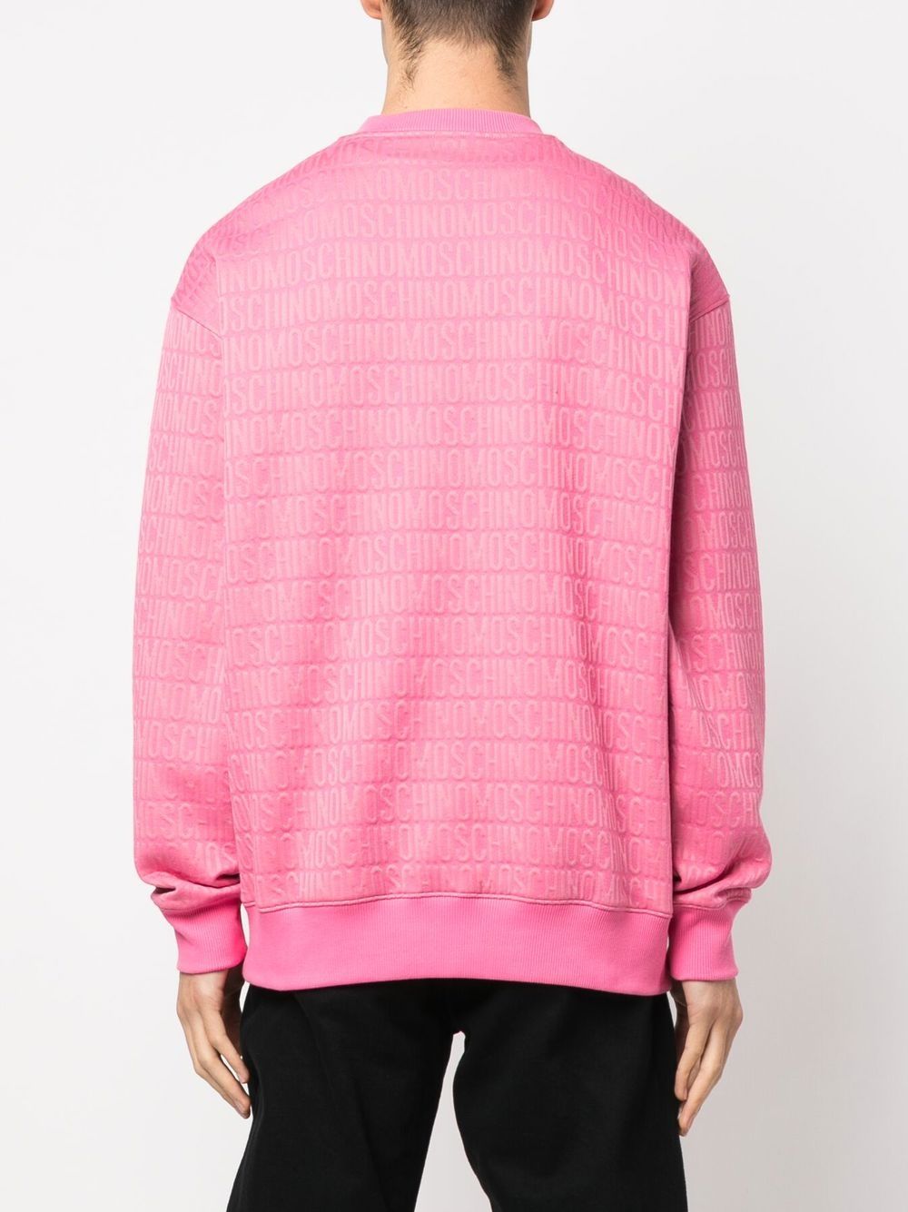 Shop Moschino All-over Logo-print Sweater In Pink