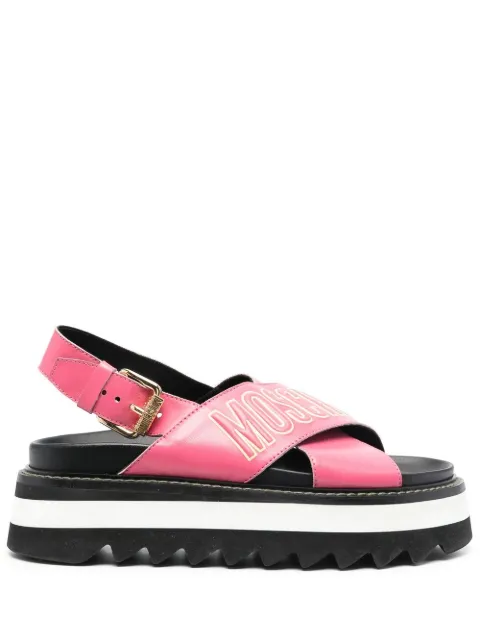 Moschino sandalias con plataforma y logo estampado 