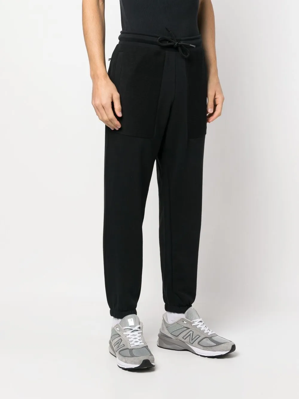 NEW BALANCE ZIP-FASTENING POCKET TRACK PANTS