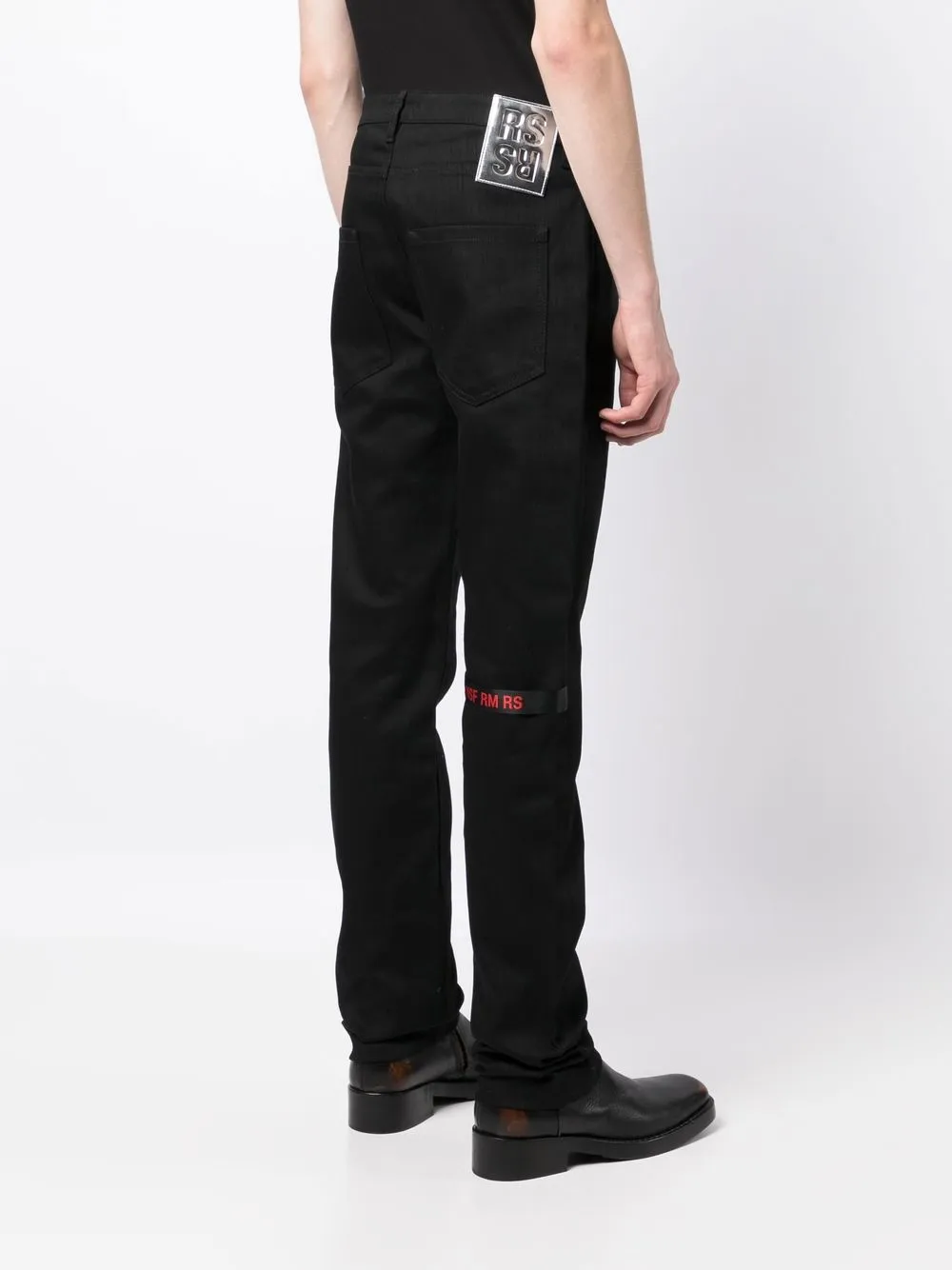 Raf Simons Logo-patch Trousers In Schwarz