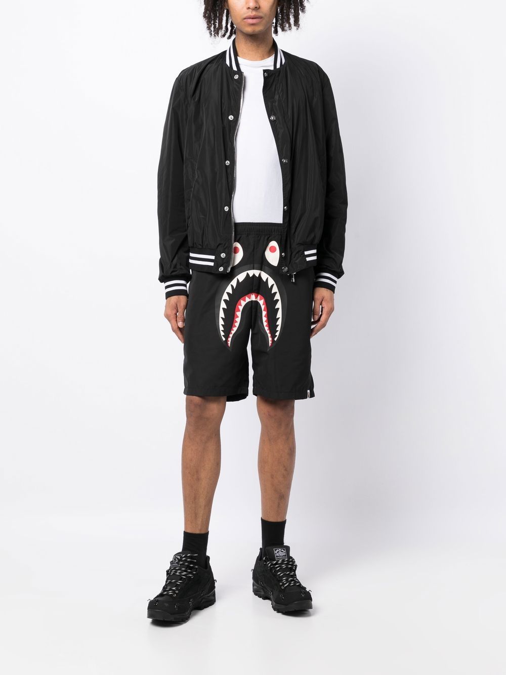 A BATHING APE® Bermuda shorts met print - Zwart