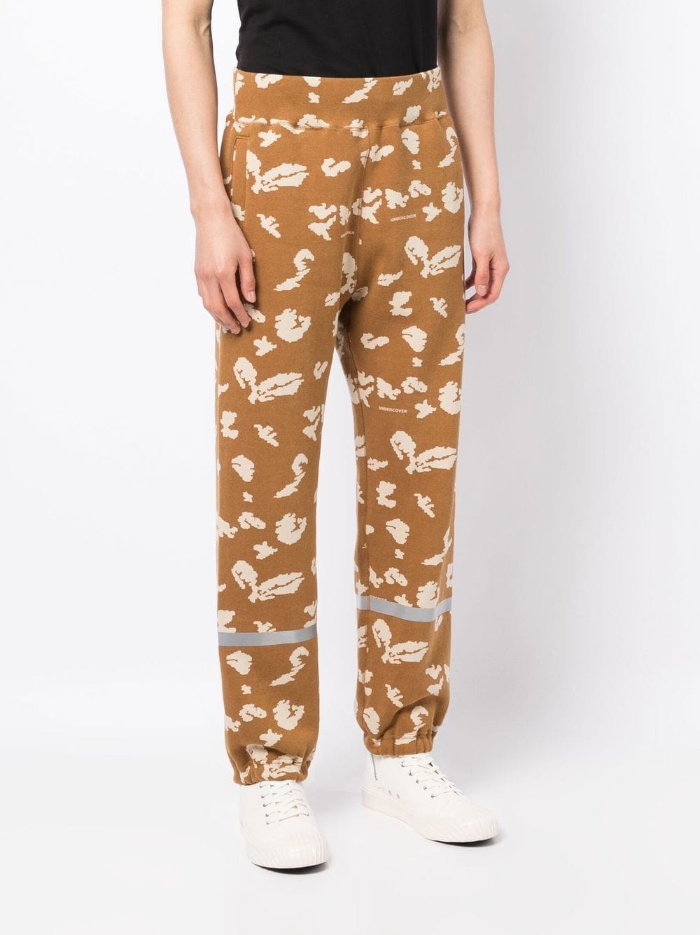 Shop Undercover Abstract-print Track Pants In Brown