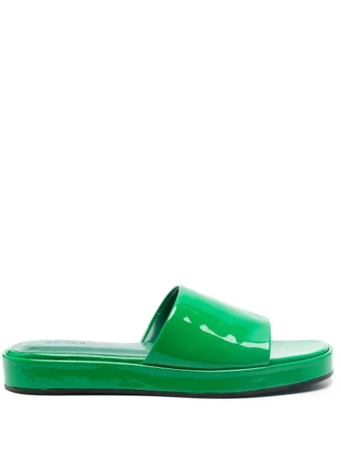 BY FAR Cala patent-finish slides