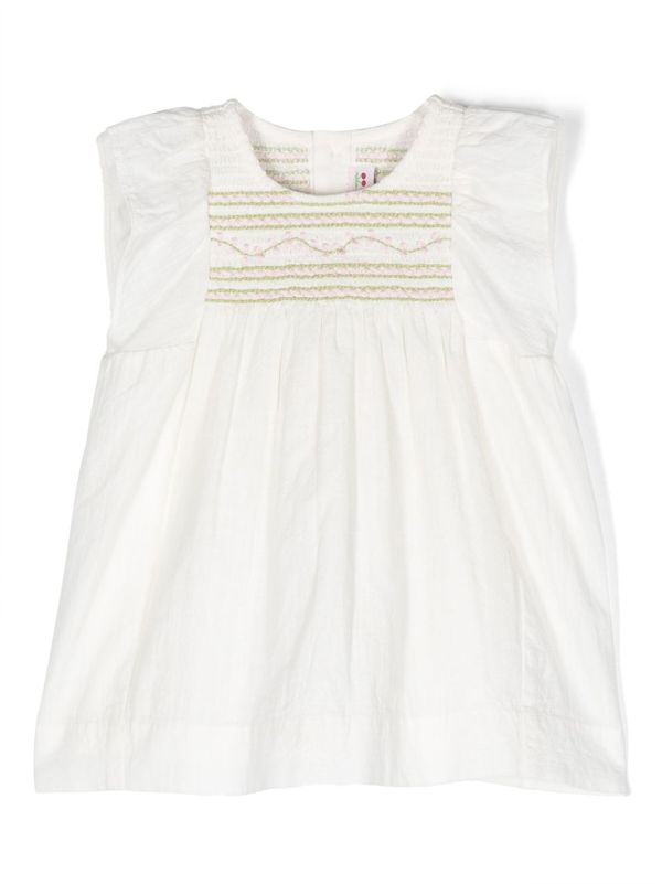 white sleeveless smock dress