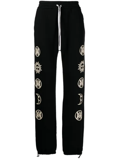 Pantalon à imprimé graphique - AMIRI - Modalova