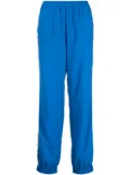 AMBUSH stripe-detailing logo-print track pants - Blue