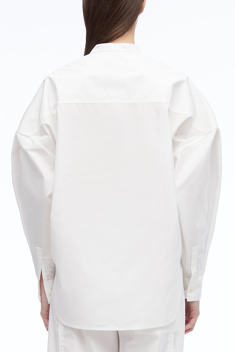 Long Sleeve Band Collar Poplin Shirt -white #1 Long Sleeve Band Collar Poplin Shirt , band collar oversized shirt from 3.1 PHILLIP LIM featuring white, cotton blend, band collar, drop shoulder, front button fastening, oversize arms, chest patch pocket, buttoned cuffs and curved hem.- 3