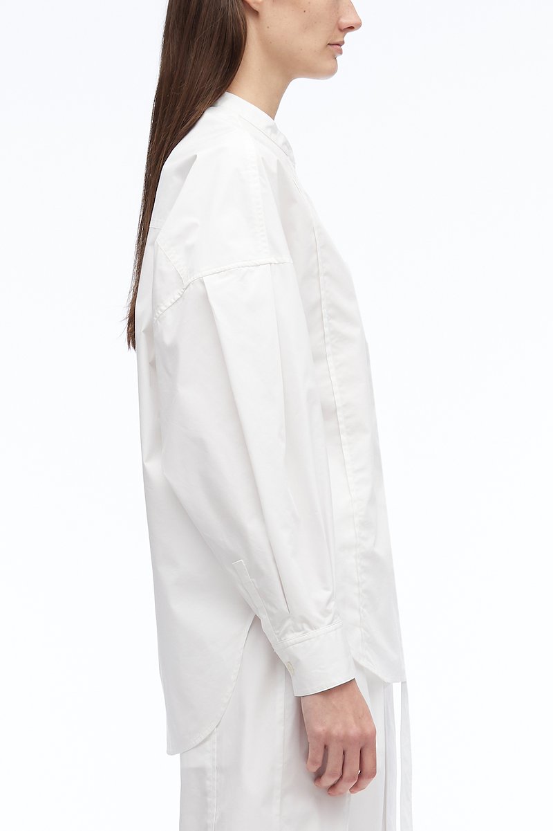 Long Sleeve Band Collar Poplin Shirt -white #0 Long Sleeve Band Collar Poplin Shirt , band collar oversized shirt from 3.1 PHILLIP LIM featuring white, cotton blend, band collar, drop shoulder, front button fastening, oversize arms, chest patch pocket, buttoned cuffs and curved hem.- 2
