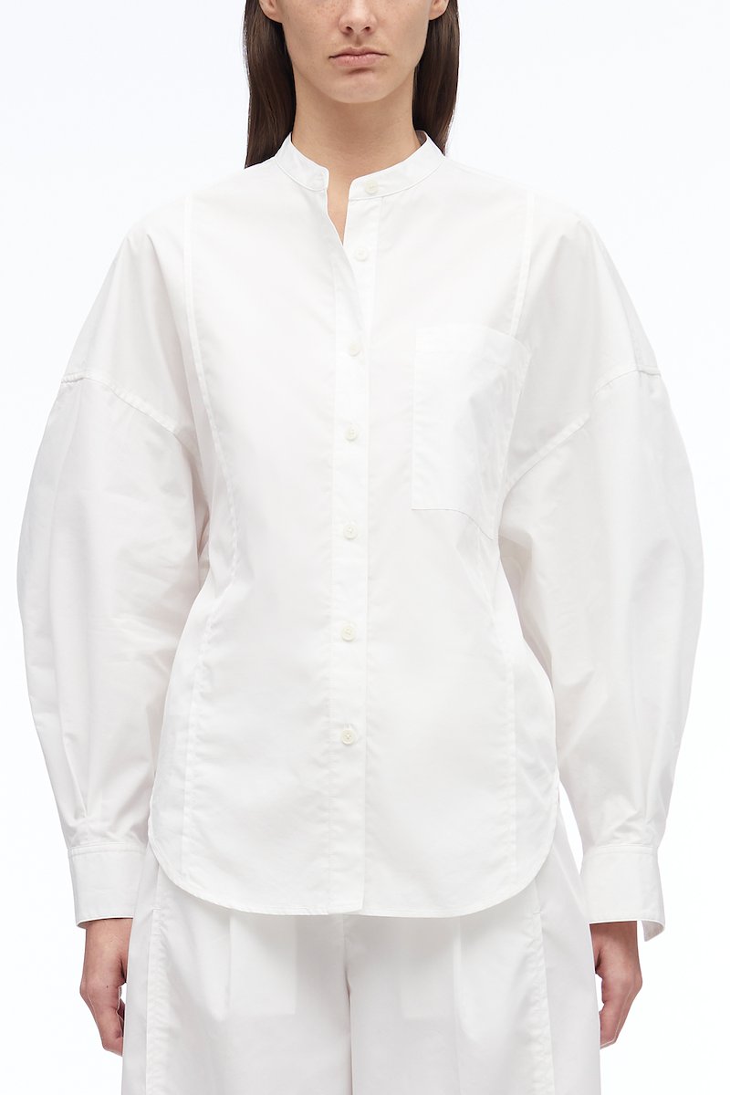 Long Sleeve Band Collar Poplin Shirt -white #1 Long Sleeve Band Collar Poplin Shirt , band collar oversized shirt from 3.1 PHILLIP LIM featuring white, cotton blend, band collar, drop shoulder, front button fastening, oversize arms, chest patch pocket, buttoned cuffs and curved hem.- 1
