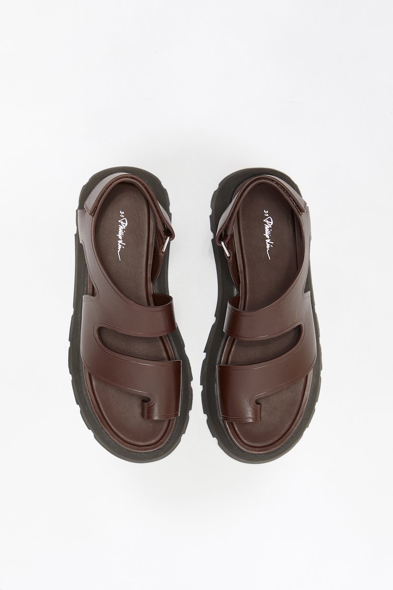 Kate Lug Sole Wave Sandal-brown #1 Kate Lug Sole Wave Sandal, Kate lug-sole sandals from 3.1 PHILLIP LIM featuring chocolate brown, calf leather, branded leather insole, open toe, buckle-fastening ankle strap and rubber lug sole.- 1